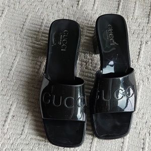 Black Gucci plastic sandals